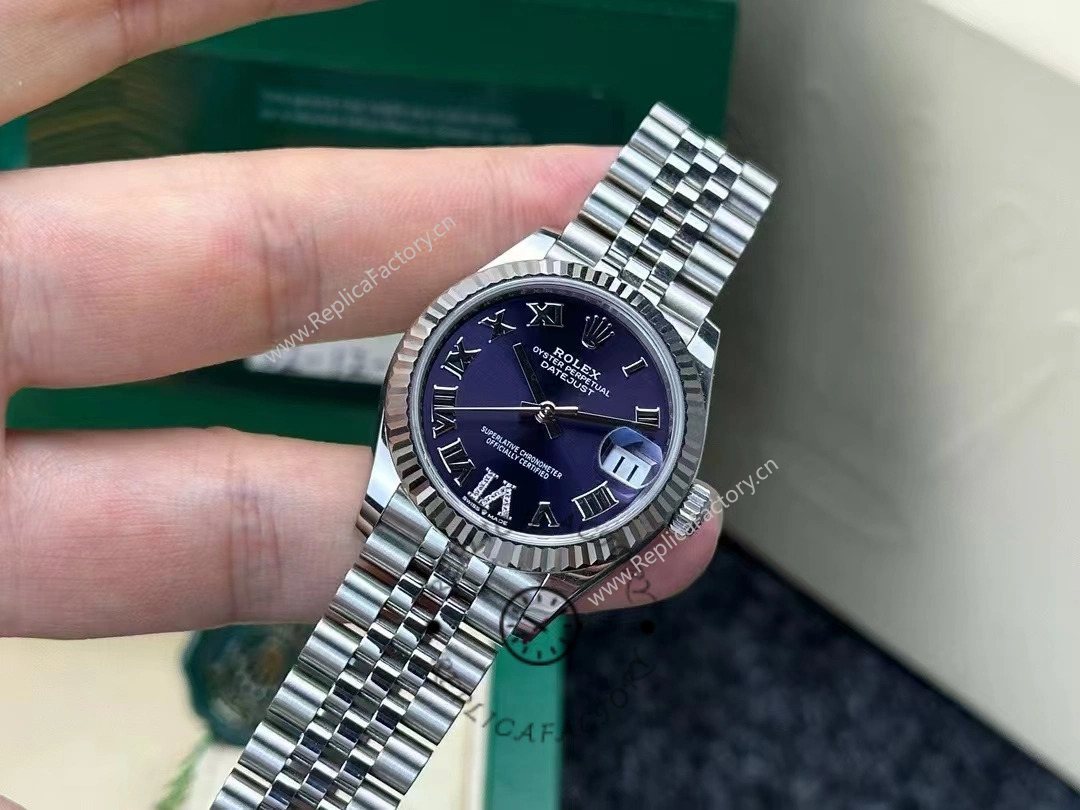 Two-year used Rolex Datejust 31mm 278274-0018 close-up showing dial clarity and fluted bezel still in great shape